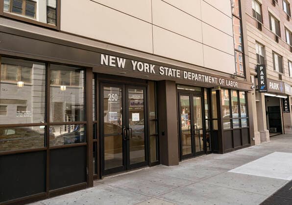 Unemployment claims soared because of COVID-19 pandemic View of Brooklyn office of NYS Department of Labor as unemployment claims in USA soared to 3.3 million in week ended March 21 because of COVID-19 pandemic New York New York United States Copyright: LevxRadin