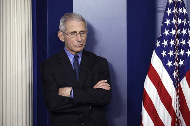 Director of the National Institute of Allergy and Infectious Diseases Dr. Anthony Fauci listens to U.S. President Donald Trump (not pictured) during a press briefing on the Coronavirus COVID-19 pandemic with members of the Coronavirus Task Force at the White House in Washington, DC on Thursday, March 26, 2020.  WAX20200326206 YURIxGRIPAS