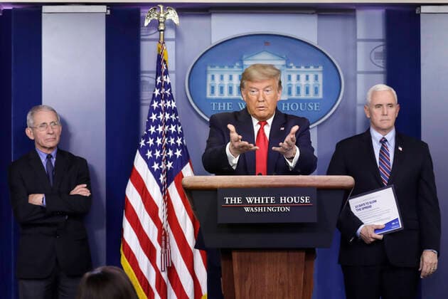 United States President Donald J. Trump, center, speaks as US Vice President Mike Pence, right, and Director of the National Institute of Allergy and Infectious Diseases Dr. Anthony Fauci, left, listen during a press briefing on the Coronavirus COVID-19 pandemic with members of the Coronavirus Task Force at the White House in Washington on March 26, 2020. Copyright: xYurixGripasx xPoolxviaxCNPx MediaPunchx