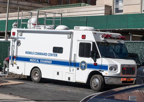 NY: Construction for overflow capacity for city morgue Mobile Command Center by Medical Examiner seen at site of construction of tents for overflow capacity for city morgues on Manhattan East side near Bellevue hospital New York New York United States Copyright: LevxRadin