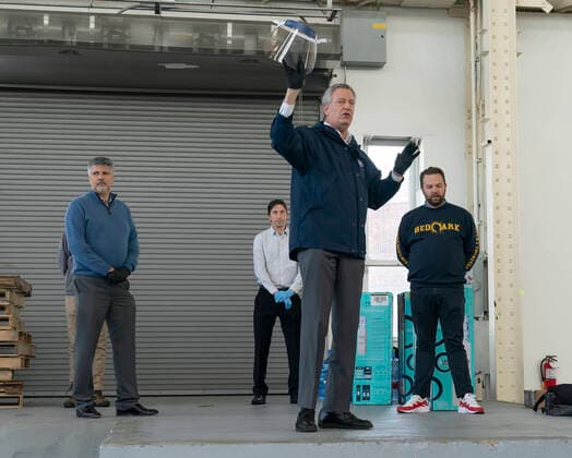 NY: Mayor Bill de Blasio tours Duggal facility Mayor Bill de Blasio tours place where facial shields manufactured by Duggal company at Duggal Greenhouse New York New York United States Copyright: LevxRadin