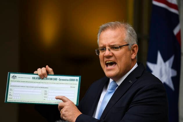 SCOTT MORRISON CORONAVIRUS UPDATE, Australian Prime Minister Scott Morrison holds up a Coronavirus Isolation Declaration Card as he speaks to the media during a press conference at Parliament House in Canberra, Friday, March 27, 2020. ( NO ARCHIVING, EDITORIAL USE ONLY, NO USE IN BOOKS WITHOUT CONSENT CANBERRA ACT AUSTRALIA  Copyright: xLUKASxCOCHx 20200327001460391100