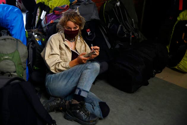 March 27, 2020, Kathmandu, Nepal: Tourists from Germany whom were stranded due to the lockdown imposed by the government amid concerns on the spread of coronavirus wait for their chartered flight back to Germany at Tribhuvan International Airport in Kathmandu, Nepal on Friday, March 27, 2020. Kathmandu Nepal - ZUMAg200 20200327_zap_g200_002 Copyright: xSkandaxGautamx
