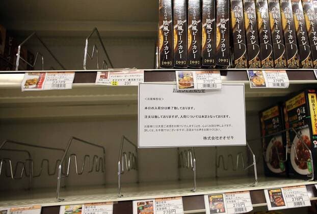 March 27, 2020, Tokyo, Japan - Empty shelves are seen in the morning of a supermarket in Tokyo, Japan on March 27, 2020. People rushed to stores to stockpile food and supplies after Tokyo governor called for residents to refrain from going outside this weekend for non-essential reasons, due to concerns over the coronavirus.  (124792448)