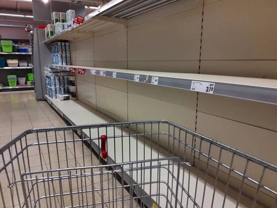Shopping at a discount store in the Hanover area Empty shelves for hygiene products such as toilet paper and kitchen rolls Purchasing