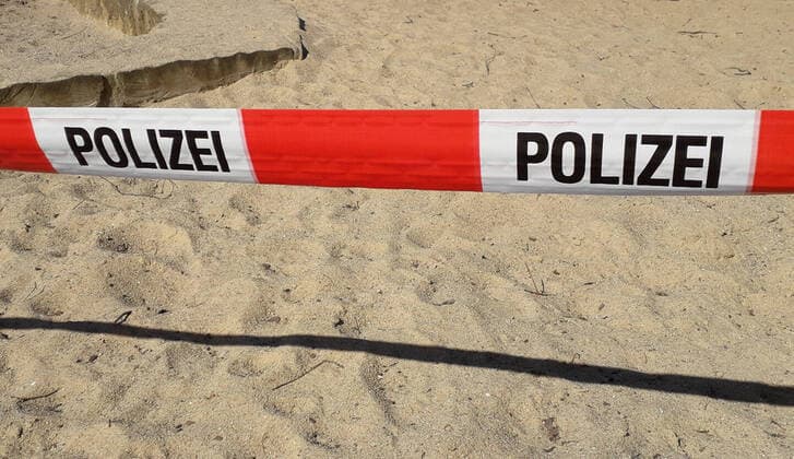 Coronavirus crisis police tape around a playground in Hamburg