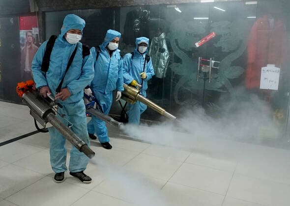 (200327) -- WUHAN, March 27, 2020 -- Staff members disinfect a shopping mall at the Hanzheng Street in Wuhan, central China s Hubei Province, March 27, 2020. The shopping mall was thoroughly cleaned and disinfected before resumption of business. ) CHINA-HUBEI-WUHAN-SHOPPING MALL-DISINFECTION (CN) WangxYuguo 