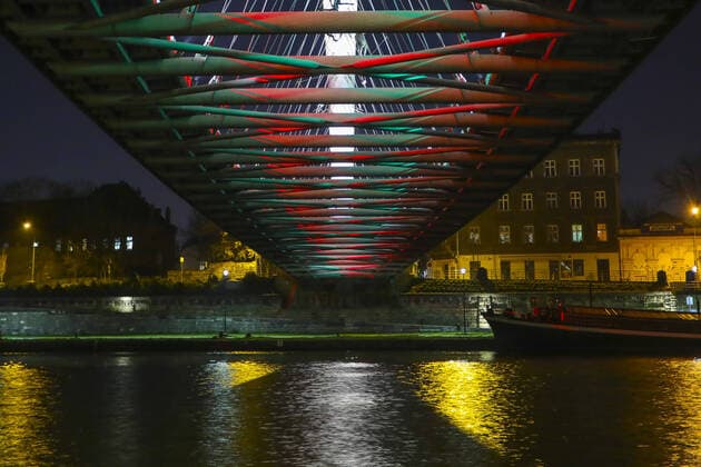 Italian national colours are illuminated on architectural buildings in Krakow Italian national colours are illuminated on architectural buildings on March 26, 2020 in Krakow, Poland to emphasize the solidarity with Italians fighting with the coronavirus pandemic EN_01422038_0032 