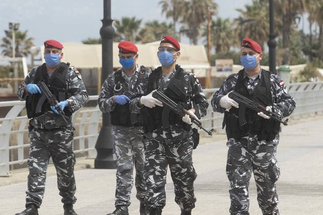 Lebanese armed police wearing protective face masks against COVID-19 patrol Beirut seafront to prevent public gatherings as Beirut goes into lockdown to stop the spread of coronavirus disease Where: Beirut, Lebanon When: 27 Mar 2020 Credit: Amer Ghazzal Cover Images Copyright: xx 40413278 EDITORIAL USE ONLY. NOT FOR USE BY NEWSPAPERS BASED IN THE UK.