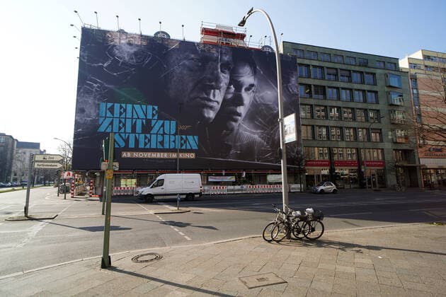 27 03 2020,Berlin,Germany,GER,the city in times of the corona pandemic, large poster advertisement for the 25 James Bond movie No time to die Seen in the district of Charlottenburg Originally, the worldwide release was scheduled for the beginning of April.