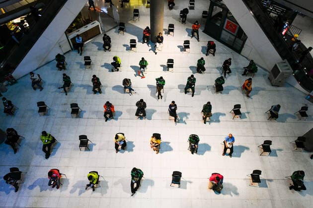 March 27, 2020, Bangkok, Thailand: People practice social distancing as they sit on chairs spread apart in a waiting area for take-away food orders at a shopping mall in hopes of preventing the spread of the coronavirus in Bangkok. Bangkok Thailand - ZUMAs197 20200327_zaa_s197_018 Copyright: xAmpholxThongmueangluangx