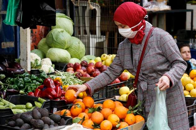 April 27, 2020, Beirut, Beirut, Lebanon: A Lebanese women wearing a mask as preventive measure against the coronavirus COVID-19 during a shopping at the Lebanese market, in Beirut, Lebanon, on March 27, 2020, as streets remain deserted after measures were taken in order to limit the spread of the Covid-19 coronavirus Beirut Lebanon - ZUMAap3_ 20200427_zaf_ap3_005 Copyright: xMarwanxTahtahx