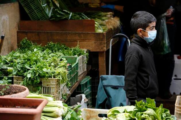 April 27, 2020, Beirut, Beirut, Lebanon: Lebanese wearing a mask as preventive measure against the coronavirus COVID-19 during a shopping at the Lebanese market, in Beirut, Lebanon, on March 27, 2020, as streets remain deserted after measures were taken in order to limit the spread of the Covid-19 coronavirus Beirut Lebanon - ZUMAap3_ 20200427_zaf_ap3_007 Copyright: xMarwanxTahtahx
