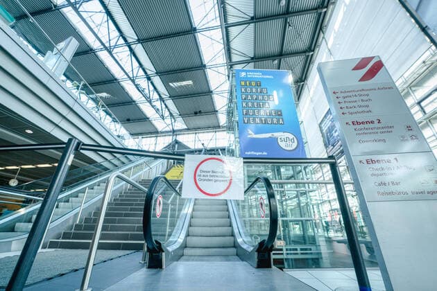 Airport Dresden Blocked escalators at deserted Dresden Airport All check-in counters are unmanned and closed Maximum one flight takes off or lands during the day ¨