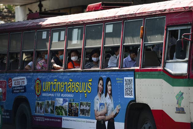 March 27, 2020, Bangkok, Thailand: Passengers on a bus wearing surgical masks as a preventive measure, during the coronavirus (Covid-19) pandemic..Thai government imposed a state of emergency decree that started on March 26, 2020 for the tackle to coronavirus (Covid-19) pandemic. On March 27, 2020 Thai public health ministry reported 91 new cases patients of coronavirus (Covid-19), raising the total to 1,136 and 5 deaths. Bangkok Thailand - ZUMAs197 20200327_zaa_s197_040 Copyright: xVachiraxKalongx