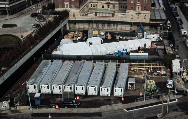 March 27, 2020, New York Manhattan, USA: NYC building Makeshift morgue using 8 refrigerated trucks outside Bellevue Hospital in Manhattan to deal with a potential surge of coronavirus victims, . . 03 27 20. New York Manhattan. . New York Manhattan. USA - ZUMAs252 20200327_znp_s252_003 Copyright: xMarcusxSantosx