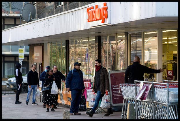 . 27 03 2020. London, United Kingdom. Social Distancing. Customers keeping two metres apart in a queue at a branch of SainsburyÕs.  xMartynxWheatleyx xi-Imagesx IIM-20963-0007