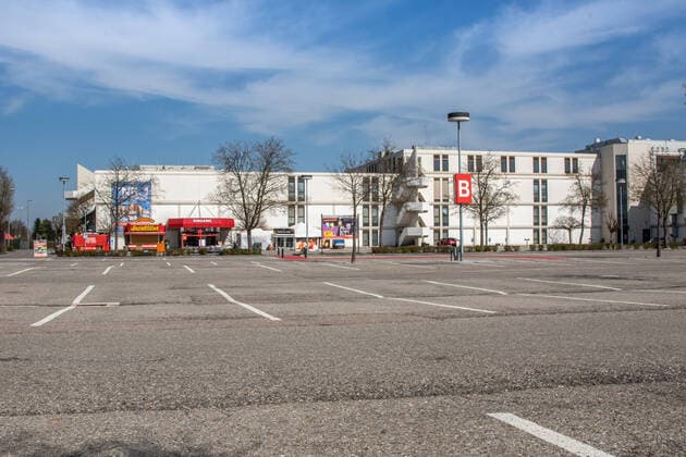 furniture store empty parking spaces during corona crisis exit restriction measure impressions outside in the exit restriction corona virus