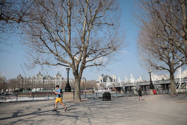 The streets of downtown London are near empty after Prime Minister Boris Johnson imposed a national lockdown from the rapidly spreading Coronavirus Pandemic, in London on Friday, March 27, 2020. Prime Minister Boris Johnson announced today that he is self-isolating after testing positive for the coronavirus.  LON2020032710 HUGOxPHILPOTT
