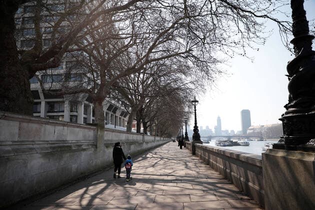 The streets of downtown London are near empty after Prime Minister Boris Johnson imposed a national lockdown from the rapidly spreading Coronavirus Pandemic, in London on Friday, March 27, 2020. Prime Minister Boris Johnson announced today that he is self-isolating after testing positive for the coronavirus.  LON2020032712 HUGOxPHILPOTT