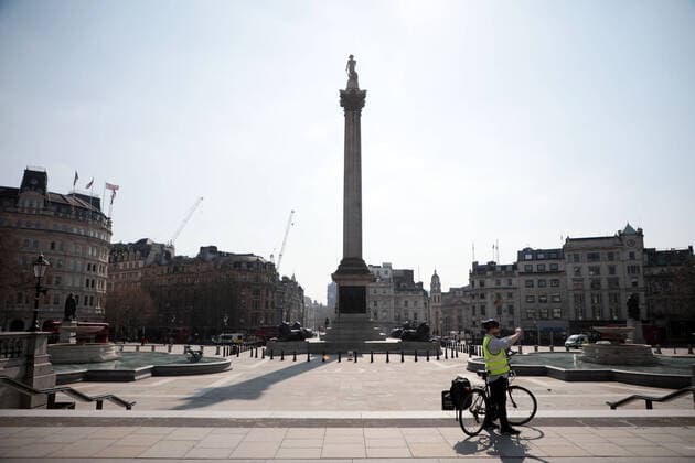 The streets of downtown London are near empty after Prime Minister Boris Johnson imposed a national lockdown from the rapidly spreading Coronavirus Pandemic, in London on Friday, March 27, 2020. Prime Minister Boris Johnson announced today that he is self-isolating after testing positive for the coronavirus.  LON2020032716 HUGOxPHILPOTT