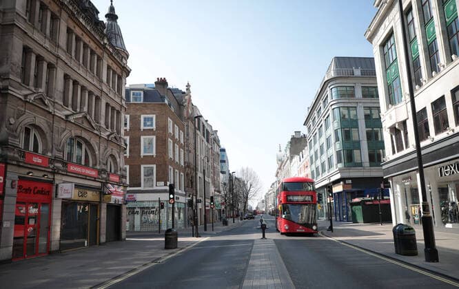The streets of downtown London are near empty after Prime Minister Boris Johnson imposed a national lockdown from the rapidly spreading Coronavirus Pandemic, in London on Friday, March 27, 2020. Prime Minister Boris Johnson announced today that he is self-isolating after testing positive for the coronavirus.  LON2020032720 HUGOxPHILPOTT