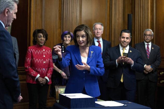 Speaker of the House Nancy Pelosi speaks during a signing ceremony after the House passed the $2.2 trillion CARES Act at the U.S. Capitol on Friday, March 27, 2020 in Washington, D.C. The stimulus bill, the largest in U.S history, provides economic bailouts to companies, independent contractors and includes direct payments to individuals as the U.S. suffers from the COVID-19 pandemic.  WAP202003278040 STEFANIxREYNOLDS