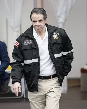 Gov. Andrew Cuomo arrives before speaking with the New York National Guard on site at the Jacob K. Javits Convention Center in New York City on Friday, March 27, 2020. The Javits Center is setting up to be turned into field hospitals to test and possibly treat cases of COVID-19 infections. Almost half of the United States are under stay-at-home orders and the United States has become the country with the most confirmed coronavirus cases at over 94,000.  NYP20200327105 JOHNxANGELILLO