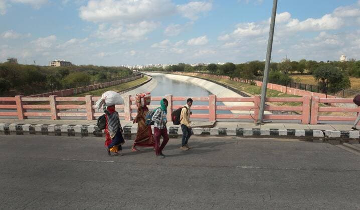 JAIPUR, INDIA - MARCH 27: Migrant workers leave for Jabalpur on foot owing to public transport being suspended, on day 3 of the three week nationwide lockdown to check the spread of Coronavirus COVID-19 , on March 27, 2020 in Jaipur, India. (Photo by Himanshu Vyas Hindustan Times) Hit By Lockdown, Migrant Workers Walk To Reach Homes