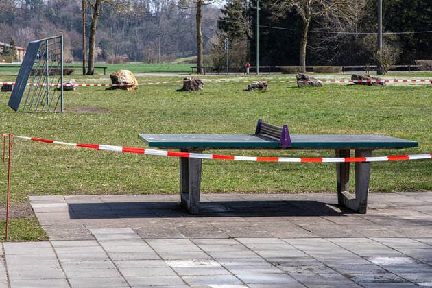 Table tennis table and football pitch with barrier tape Impressions from the time of the curfew in the Coronavirus Pandemic in Bavaria Impressions Outside in the curfew Corona Virus