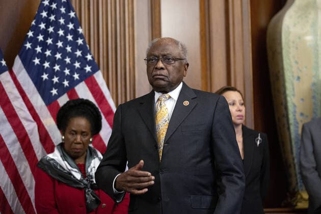 U.S. Representative James Clyburn listens during a signing ceremony of the $2.2 trillion CARES Act at the U.S. Capitol on Friday, March 27, 2020 in Washington, D.C. The stimulus bill, the largest in U.S history, provides economic bailouts to companies, independent contractors and includes direct payments to individuals as the U.S. suffers from the COVID-19 pandemic.  WAP202003278050 STEFANIxREYNOLDS