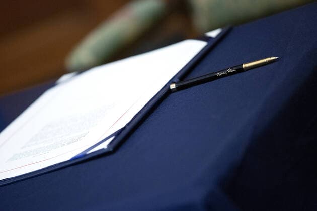 The pen of Speaker of the House Nancy Pelosi sits on a table prior to the signing ceremony of the $2.2 trillion CARES Act at the U.S. Capitol on Friday, March 27, 2020 in Washington, D.C. The stimulus bill, the largest in U.S history, provides economic bailouts to companies, independent contractors and includes direct payments to individuals as the U.S. suffers from the COVID-19 pandemic.  WAP202003278049 STEFANIxREYNOLDS