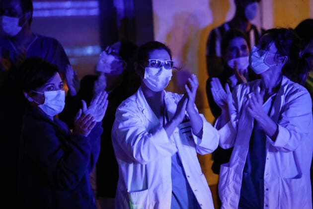 March 27, 2020, Valdemoro, MADRID, SPAIN: Illustration, Medical Staff and Police Corps thank each other for the work they do at Infanta Elena Hospital of Valdemoro, Madrid, during the second week after the Government declared the state of alarm in Spain and recommended people to stay at home to fight coronavirus COVID-19 on March 27, 2020 in Valdemoro, Madrid, Spain Valdemoro SPAIN - ZUMAa181 20200327_zaa_a181_111 Copyright: xOscarxJ.xBarrosox