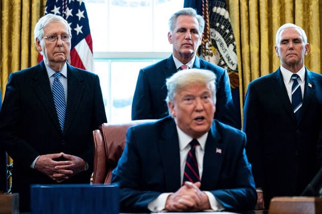 March 27, 2020, Washington, District of Columbia, USA: United States President Donald J. Trump participates in a signing ceremony for a two trillion dollar coronavirus relief bill in the Oval Office at the White House in Washington, DC on March 27, 2020. Standing behind the President from left to right: US Senate Majority Leader Mitch McConnell (Republican of Kentucky); US House Minority Leader Kevin McCarthy (Republican of California); and US Vice President Mike Pence. Washington USA - ZUMAs152 20200327_zaa_s152_012 Copyright: xErinxSchaffx