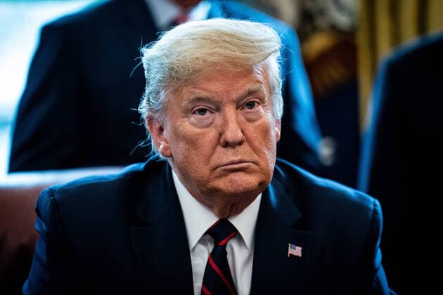 President Donald Trump participates in a signing ceremony for a two trillion dollar coronavirus relief bill in the Oval Office at the White House in Washington, DC on March 27, 2020. The economic stimulus package, the largest in U.S. history, provides economic bailouts to companies, independent contractors and includes direct payments to individuals as the U.S. suffers from the COVID-19 pandemic.  WAX20200327415 ERINxSCHAFF