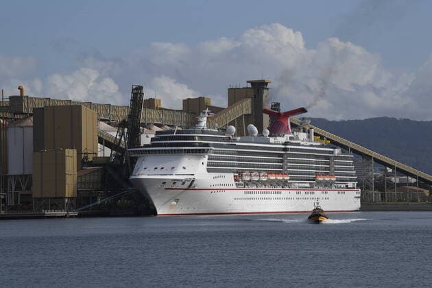 AUSTRALIA CORONAVIRUS COVID-19, The cruise ship Carnival Spirit docks at Port Kembla in Wollongong, Saturday, March 28, 2020. The Federal Government yesterday announced that any international travellers arriving in Australia will be quarantined in a hotel for 14 days before being allowed to return home. ( NO ARCHIVING, EDITORIAL USE ONLY, NO USE IN BOOKS WITHOUT CONSENT SYDNEY NSW AUSTRALIA  Copyright: xDEANxLEWINSx 20200328001460527789