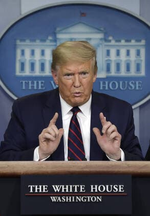 U.S. President Donald Trump speaks during a press briefing on the Coronavirus COVID-19 pandemic with members of the Coronavirus Task Force at the White House in Washington, DC on Friday, March 27, 2020.  WAX20200327207 YURIxGRIPAS