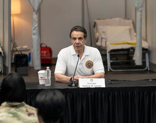 NY: Andrew Cuomo addresses National Guard members Governor Andrew Cuomo addresses National Guard members and media praising complition of makeshift hospitals at Jacob Javits Center New York New York United States Copyright: LevxRadin