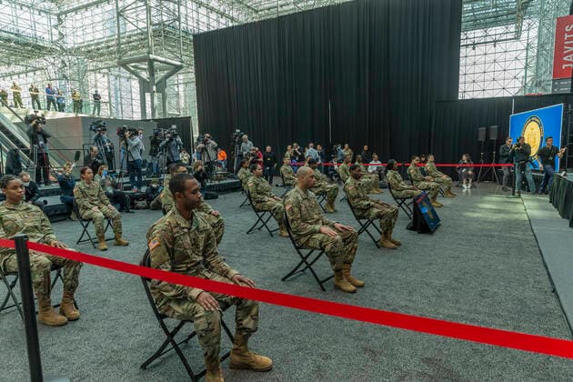 NY: Andrew Cuomo addresses National Guard members National Guard members and media attend Governor Andrew Cuomo address praising complition of makeshift hospitals at Jacob Javits Center New York New York United States Copyright: LevxRadin