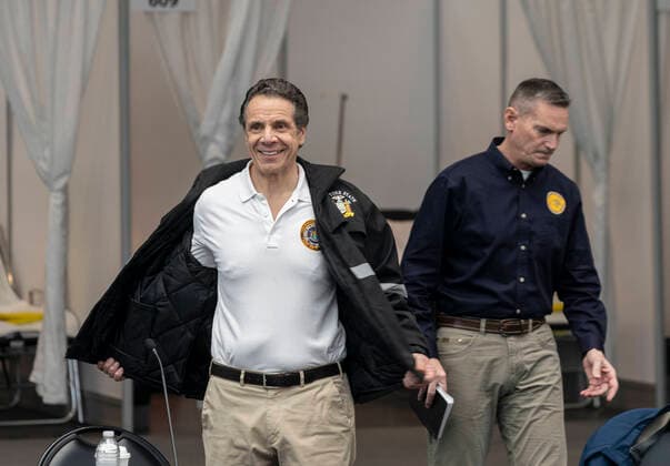 NY: Andrew Cuomo addresses National Guard members Governor Andrew Cuomo arrives to address National Guard members and media praising complition of makeshift hospitals at Jacob Javits Center New York New York United States Copyright: LevxRadin