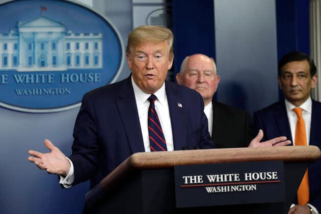 March 27, 2020, Washington, District of Columbia, USA: United States President Donald J. Trump, left, speaks during a press briefing on the Coronavirus COVID-19 pandemic with members of the Coronavirus Task Force at the White House in Washington, DC on March 27, 2020. Standing behind the President are: US Secretary of Agriculture Sonny Perdue; and Panera Bread CEO Niren Chaudhary, right Washington USA - ZUMAs152 20200327_zaa_s152_045 Copyright: xYurixGripasx