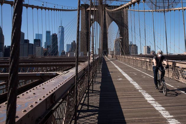 (200328) -- NEW YORK, March 28, 2020 (Xinhua) -- Photo taken on March 27, 2020 shows the empty pedestrian walk on the Brooklyn Bridge in New York, the United States. The total number of COVID-19 cases in the United States surpassed the mark of 100,000 by Friday afternoon local time, according to Johns Hopkins University. New York State reported 44,870 confirmed cases, followed by the states of New Jersey and California, respectively with 8,825 and 4,569 cases. (Photo by Michael Nagle Xinhua) U.S.-NEW YORK-COVID-19-CONFIRMED CASES 