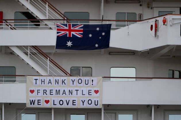 COVID-19 CRUISE PASSENGERS PERTH, Banners are hung from the cruise ship MV Artania in Fremantle harbour in Fremantle, Saturday, March 28, 2020. Nine people confirmed or suspected of being infected with coronavirus have disembarked from the MV Artania cruise ship and will be treated in Perth. None of the 800 passengers or 500 crew onboard are Australian, with the majority coming from Germany.( NO ARCHIVING, EDITORIAL USE ONLY, NO USE IN BOOKS WITHOUT CONSENT PERTH WA AUSTRALIA  Copyright: xRICHARDxWAINWRIGHTx 20200328001460577993