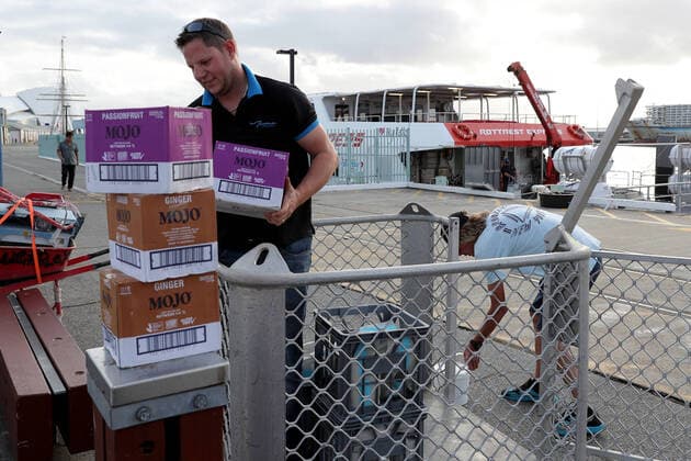 COVID-19 CRUISE PASSENGERS PERTH, Staff from Frankie s on Rotto Pizzeria on Rottnest Island offload boxes of alcohol from a Rottnest Express ferry in Fremantle harbour in Fremantle, Saturday, March 28, 2020. Rottnest Island has been evacuated to make way for some of the 800 Australian passengers from the Vasco da Gama cruise ship who will be quarantined either on WA s Rottnest Island or in a hotel for two weeks. ( NO ARCHIVING, EDITORIAL USE ONLY, NO USE IN BOOKS WITHOUT CONSENT PERTH WA AUSTRALIA  Copyright: xRICHARDxWAINWRIGHTx 20200328001460578485
