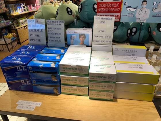 Face masks and thermometers are advertised for sale at The Green Party 313 store in Singapore on Mar 28, 2020. The masks are being sold at a high mark up as there is no regulation to control the selling price in Singapore. For reference SGD49.90 is approximately USD34.95.  (124830986)