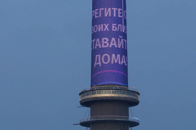 MOSCOW, RUSSIA - MARCH 28, 2020: A message reading Take care of your family. Keep well. Stay at home is seen on Ostankino Tower during the pandemic of the novel coronvirus (COVID-19). As of 28 March 2020, Russia has reported more than 1200 confirmed cases of the novel coronavirus (COVID-19), with more than 800 confirmed cases in Moscow. Artyom Geodakyan TASS  TS0D3A98