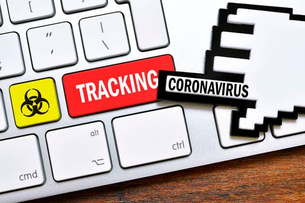 PHOTOMONTAGE, computer key with the inscription Tracking and biohazard signs, symbol photo for Coronavirus Apps ** NUR FUER REDAKTIONELLE ZWECKE ** EDITORIAL USE ONLY **