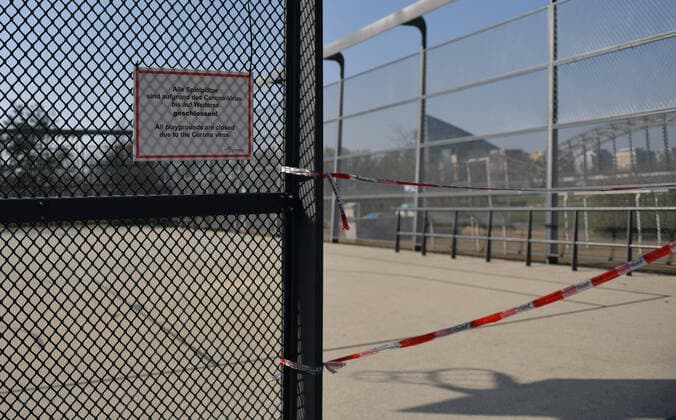 28 03 2020, xblx, Frankfurt on day 6 of the contact ban, blocked sports field at the ECB on the banks of the Main River Frankfurt am Main