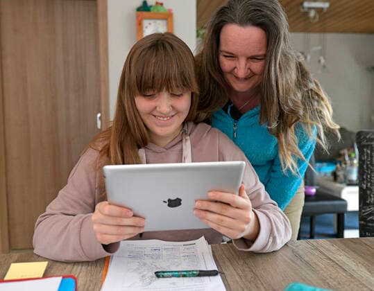28 02 2020, Children and Family, Modelreleased Home Schooling, Children in Bavaria because of the Corona Pandemic Girl sitting at her desk learning her lessons tasks on the iPad 28 02 2020, Children and Family, homeschooling 28 02 2020, Children and Family, homeschooling