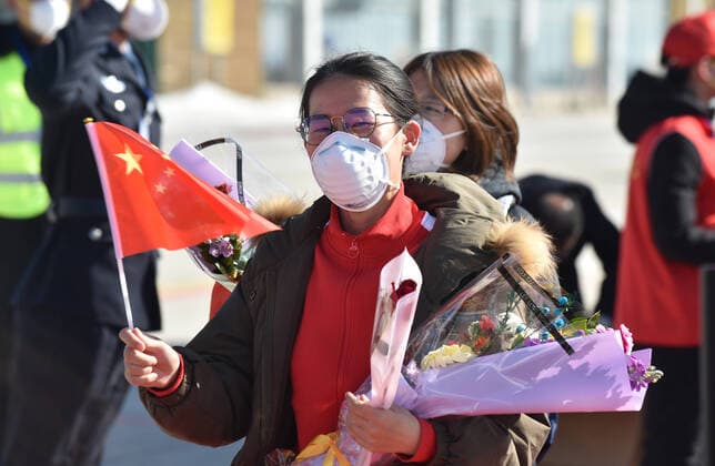 (200328) -- CHANGBAISHAN, March 28, 2020 -- Medical workers supporting virus-hit Hubei Province arrive at Changbaishan Airport in northeast China s Jilin Province, March 28, 2020. The third batch of medical assistance teams from Jilin, which consists of 404 members, returned from Hubei as the epidemic outbreak in the hard-hit province has been subdued. ) CHINA-JILIN-MEDICAL TEAM-RETURN FROM HUBEI (CN) LinxHong 
